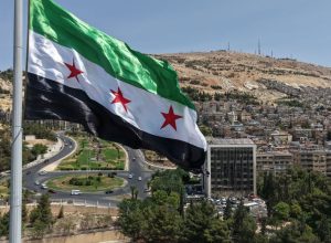 Bandeira da Síria em Damasco  • Getty Images